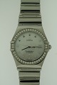 www.ebuy.dk pr�senterer: Omega Constellation, damearmb�ndsur, udf�rt i 18 kt hvidguld, kransen er prydet med 40 ...