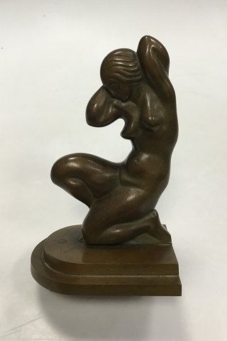 Bronzefigurine/Bookend of kneeling woman