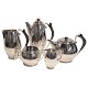Antik 
Damgaard-
Lauritsen 
presents: 
Hans 
Hansen Coffee 
and tea service 
in silver