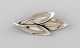 Danish modernist brooch in sterling silver in the form of leaves. 1960
