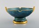 Josef Ekberg for Gustavsberg. Art deco skål i glaseret keramik. Smuk blågrøn 
glasur og gulddekoration. 1930