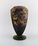L'Art 
præsenterer: 
Daum 
Nancy, 
Frankrig. Stor 
vase i 
mundblæst 
kunstglas 
dekoreret med 
landskab med 
træer. Ca. ...