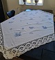 Embroidered tablecloth with Blue Flower pattern 153 x 153 cm.