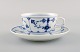 Antique Royal Copenhagen Blue Fluted Plain teacup with saucer. Model number 
1/465. Dated 1889 - 1922.
