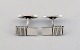 Harald Nielsen for Georg Jensen. A pair of modernist cufflinks in sterling 
silver. Mid-20th century.
