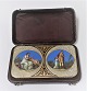 Lundin Antique 
presents: 
Gold box 
18K (750). Very 
nice box with 
enamel, very 
well 
maintained. 
Length 10 cm, 
...
