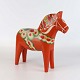 Kinnerup Antik 
& Porcelæn 
præsenterer: 
Dalarhest
26 cm
Orange, grøn 
og rød