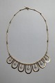 Danam Antik 
presents: 
Bent 
Gabrielsen 14 
ct Gold 
Necklace with 
Pearls