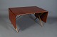 Roxy Klassik præsenterer: Hans J. Wegner/Andreas Tuck.Krydsbenbord med 2 klapper.Teak/ eg/ messing ...