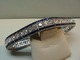 Esaias Antik a/s presenterer: 18 k gull armbånd m/ diamanter og blå safirer.