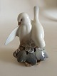 Danam Antik præsenterer: Royal Copenhagen Figur Mejer på gren #402