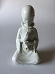 Royal Copenhagen Figur Opiums Ryger #2342. Måler 14cm og designet af Arno Malinowski.