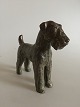 Danam Antik præsenterer: Royal Copenhagen Hund Gudrun Laursen Airedale Terrier. Måler 20,5 cm i højde og 22 cm ...