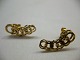 Bismarck ørestikker i 14 karat guld fremstillet i tresserne. Længde 2,1 cm og bredde 0,8 cm. ...