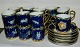 17 kopper og 6 underkopper i porcelæn med Stjernetegns-motiv. Designet af Ole Winther for ...