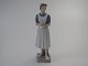 Royal Copenhagen figur i porcelæn. Sygeplejerske #4507.       1. sortering. I god stand. Sjælden ...