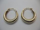 Creoler øreringe i  14  karat guld. Diameter ca. 1,9  cm og bredde ca. 2 cm. Vare nr. 180461.