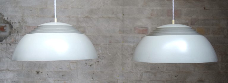 Arne Jacobsen 1902-1971. A pair of AJ pendants of gray lacquered metal.