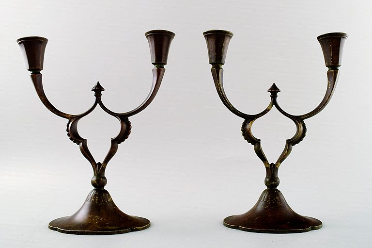 Just Andersen. Pair of two-armed candelabras of patinated bronze.
Stamped Just. Denmark 30s.