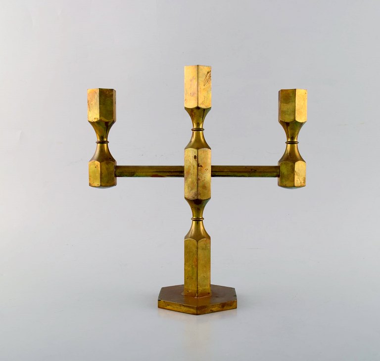 Gusum Metal. Candlestick in brass for three candles. Swedish design, 1960
