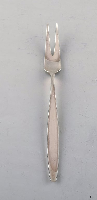 Tias Eckhoff for Georg Jensen. "Cypress" cold meat fork in sterling silver.
