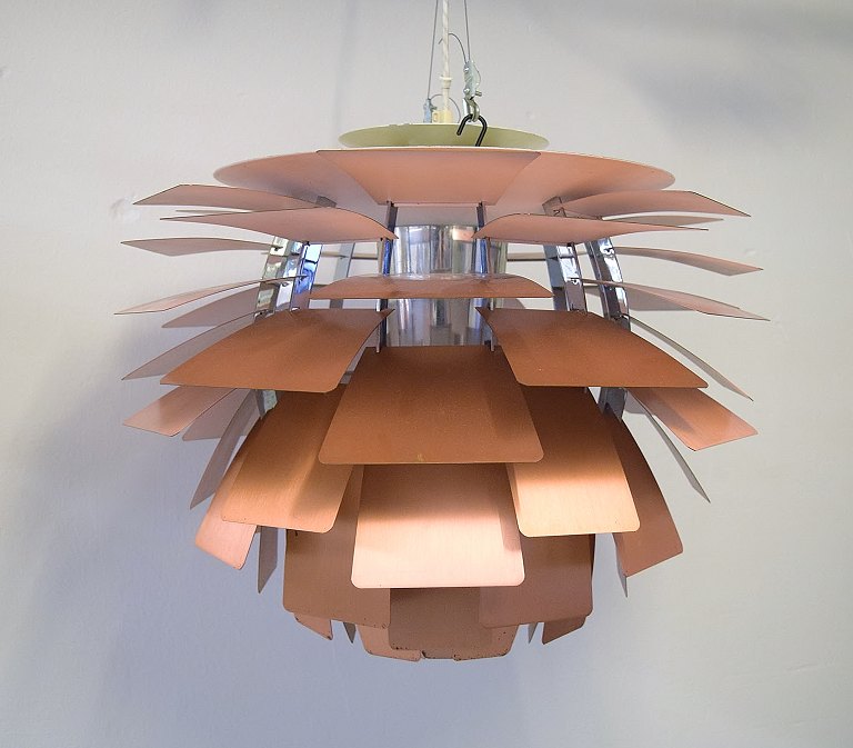 Poul Henningsen for Louis Poulsen. The "Artichoke" pendant lamp. Top shade in 
white metal, lacquered copper leaves and suspension with integrated steel line. 
Iconic Danish design. Ca. 1970.
