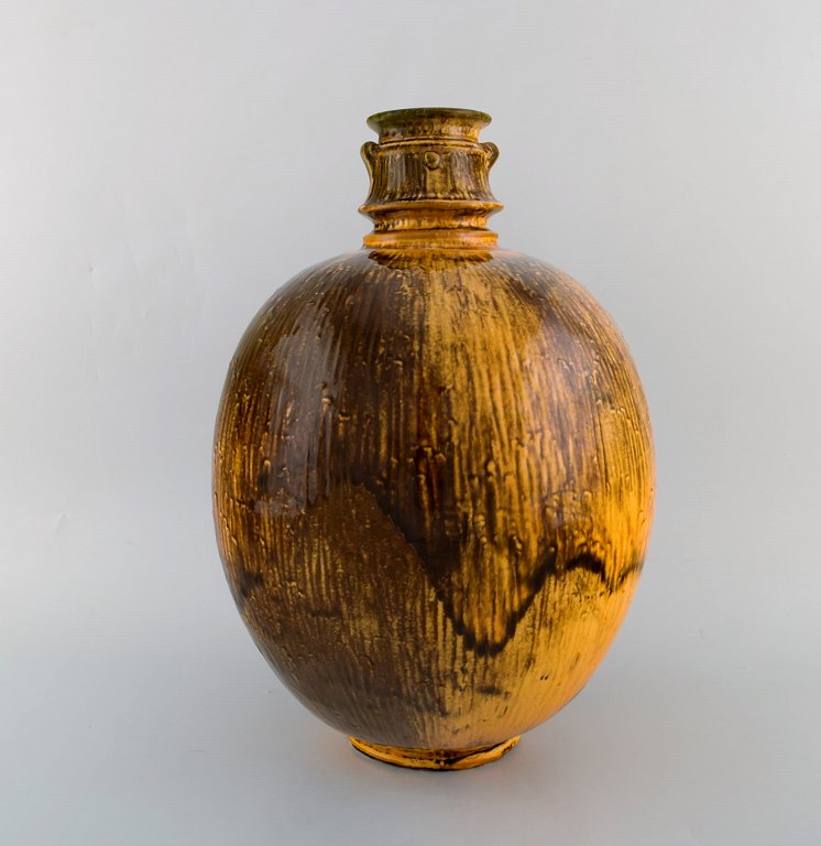 Svend Hammershøi for Kähler, HAK. Large vase in glazed stoneware with modeled 
snails on the neck. Classic Hammershøi shape. Beautiful uranium glaze. 1930 / 
40s