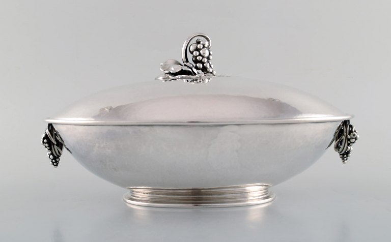 Early sterling silver Georg Jensen large oval tureen with grape and floral 
details, design #408B by Georg Jensen from circa 1921.
