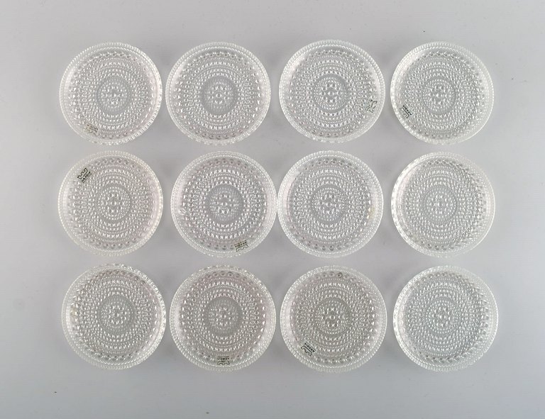 Oiva Toikka for Arabia. Set of 15 Kastehelmi coasters in clear art glass. 
Finnish design, 1970s.
