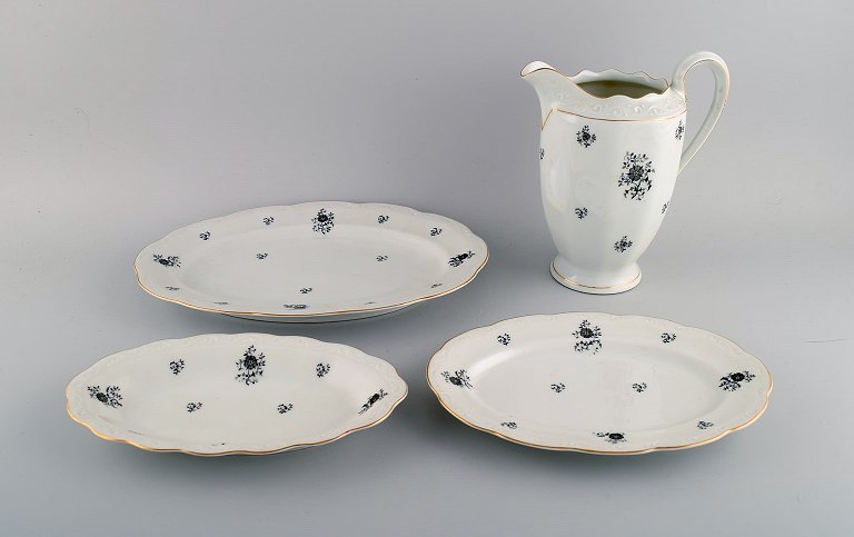 KPM, Copenhagen Porcelain Painting. Rubens jug and three oval dishes in 
hand-painted porcelain. 1930s / 40s.
