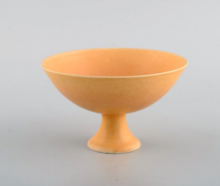 European studio ceramicist. Unique bowl on base in glazed ceramics. Beautiful 
glaze in light yellow shades. 21st Century.
