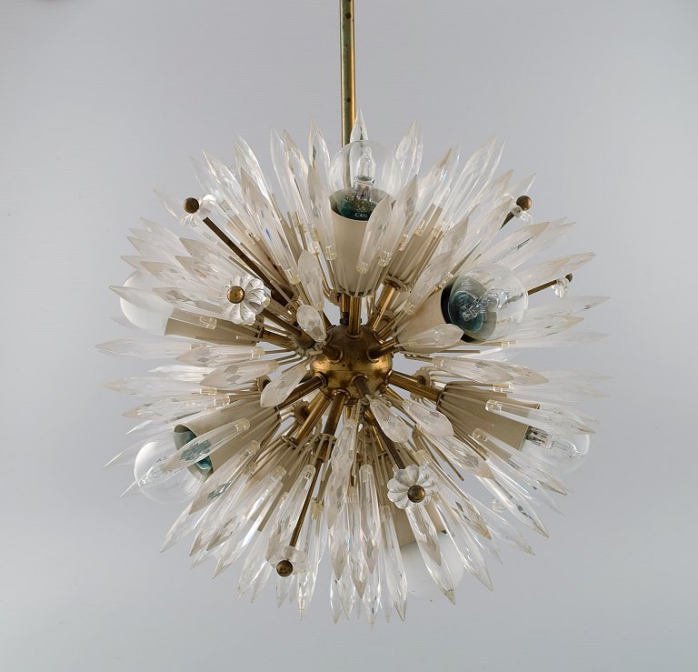 Emil Stejnar for Rupert Nikoll. Impressive ceiling lamp in brass and art glass 
shaped like crystals and flowers. Mid-20th century.

