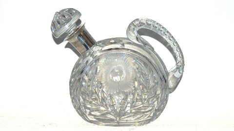 Crystal decanter with silver band on neck