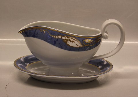 Royal Copenhagen  Blue Magnolia 563 Gravy boat on fixed stand 3.5 dl /  12 x 20 
cm
