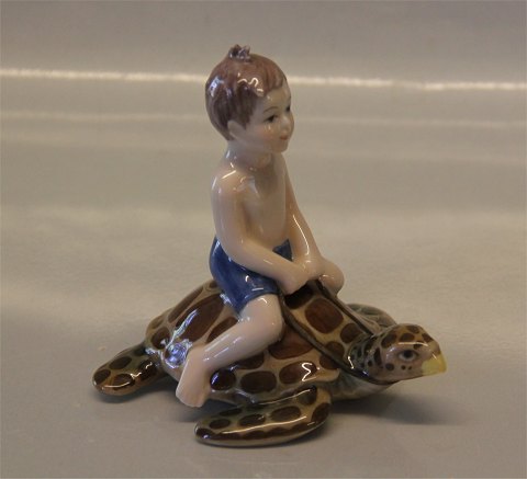 Royal Copenhagen  1242748 RC Frederik on a turtle 2003 The Millenium Collection 
(15600) 10.5 x 9.5 cm
