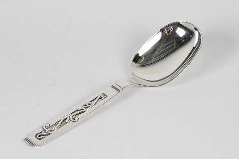 Serving spoon
of silver