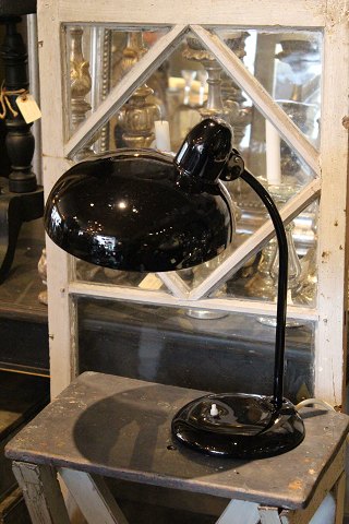 Old table lamp in black lacquered metal of the brand "Escolux"...

