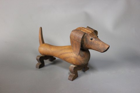 Dachshund in Walnut by Kay Bojesen.
5000m2 showroom.