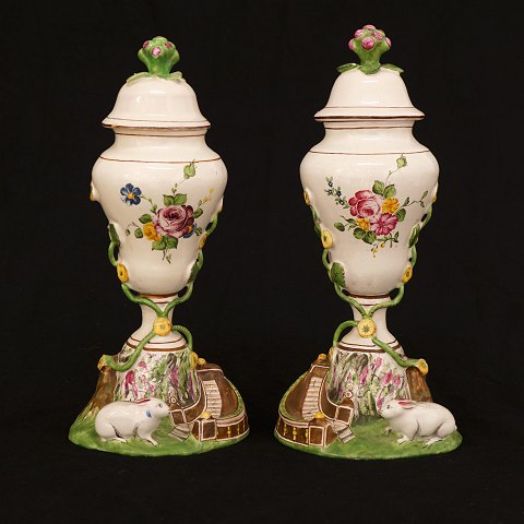 A pair of rabbit vases. Faience. Marieberg, 
Sweden. Signed 1778. H: 26,5cm