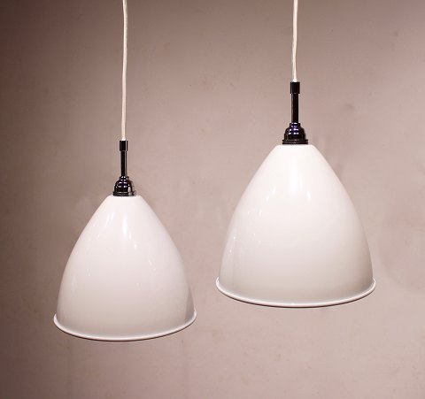 A pair of white Bestlite pendants, model BL9, by Robert Dudley Best for Gubi.