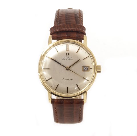 Omega Geneve i 14kt guld med automatik. Ref. 
166.037. Cal. 565.
Ca. år 1969-70.
D: 34mm