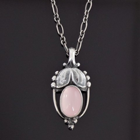 Georg Jensen; Heritage jewellery, 2003, made of sterling silver set with rose 
quartz
