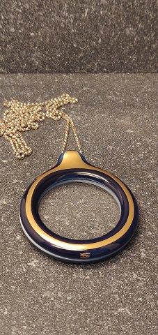 Royal Copenhagen Pendant with magnifying glass.  5.6 cm diameter. 94 cm L. Vejer 
58 g