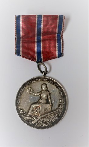 The Scandinavian shooting festival 1892, Kristiania, Norway. Reward medal 
silver. Diameter 31 mm.