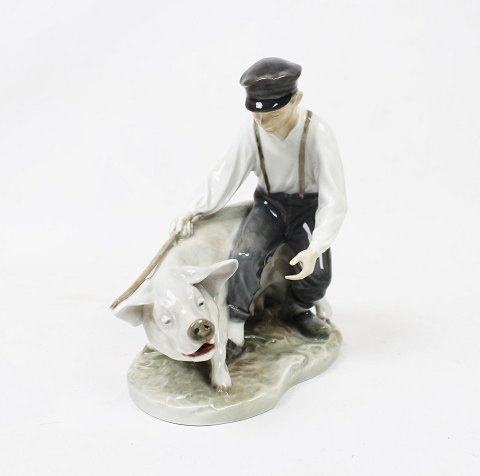 Royal Copenhagen porcelain figure, boy with pig, no.: 848.
5000m2 showroom.