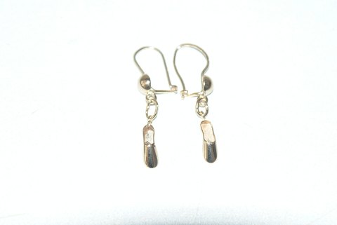 Elegant happiness galoshes ear studs 14 carat gold