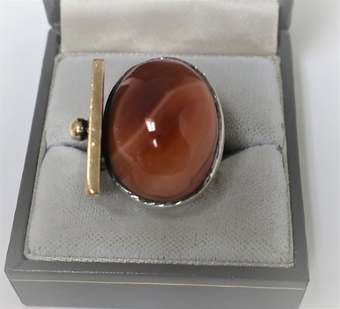 John Rörvig. Silver ring with stone and detail of gold. Stamped 925S JVR. Ring 
size 51.