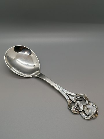 Serving spoon of three-tower silver