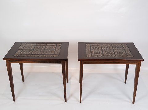 A pair of bedside tables in mahogany with brown tiles of danish design from the 
1960s.
5000m2 showroom
