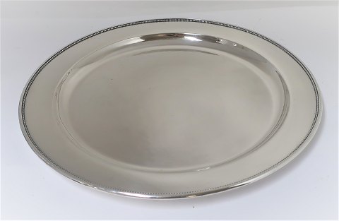 Georg Jensen. Round silver tray with pearl edge. Sterling (925). Model 210C. 
Diameter 36 cm. Produced 1933-1945.